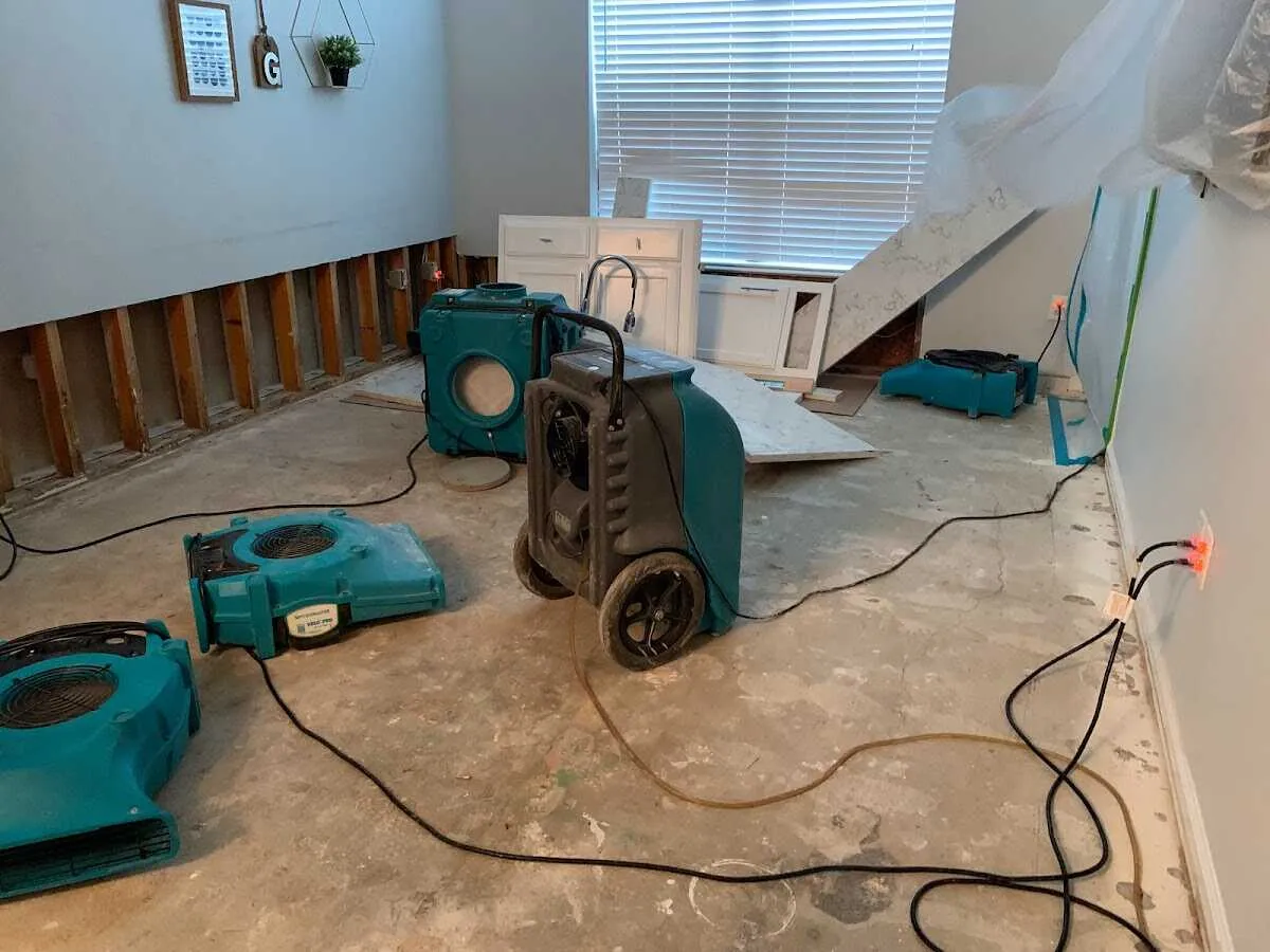 Dehumidifier in flood-cut room for Water Damage Restoration in Clover Creek